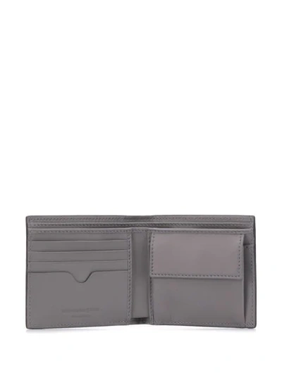 Shop Alexander Mcqueen Studded Bi-fold Wallet In 1000 Black