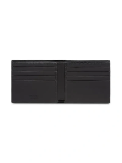 Shop Prada Logo Print Flap Wallet In Black