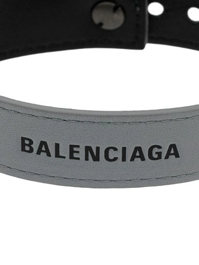 Shop Balenciaga Logo Embossed Cuff In 1217 - Grey