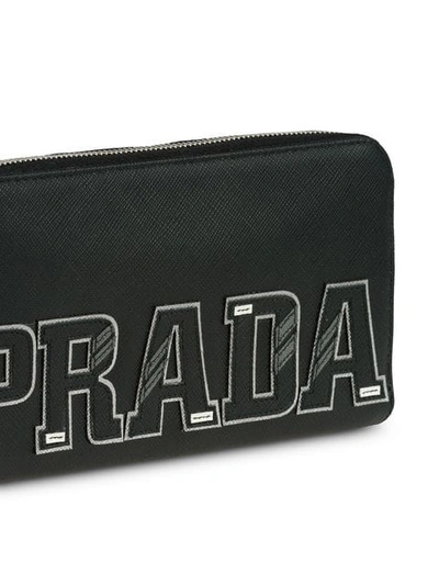 Shop Prada Portemonnaie Mit Logo-patch In Black