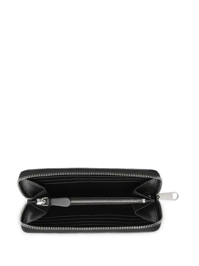 Shop Burberry Monogram Leather Ziparound Wallet In Black