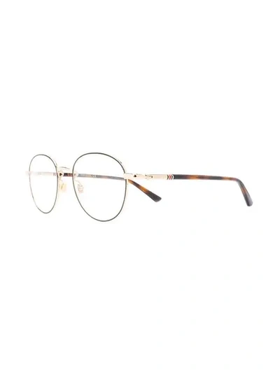 Shop Gucci Round Frame Glasses In Green