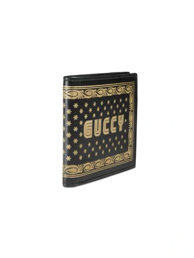 Shop Gucci Guccy Print Leather Bi-fold Wallet In Black