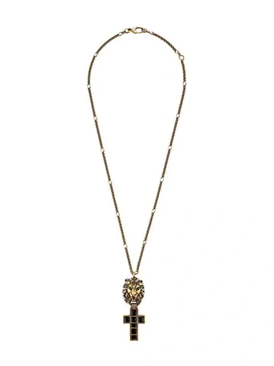 Shop Gucci Lion Head Cross Necklace In Gold