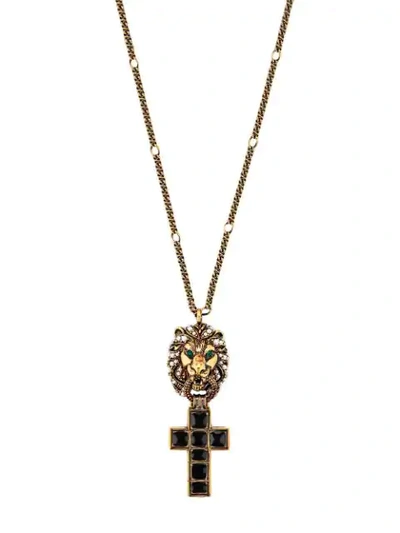 Shop Gucci Lion Head Cross Necklace In Gold