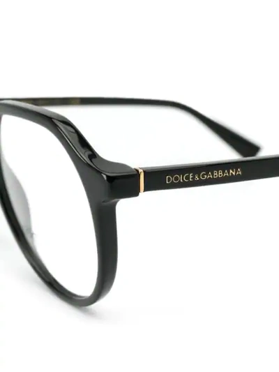 Shop Dolce & Gabbana Round Frame Glasses In Black