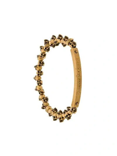 Shop Alexander Mcqueen Mini Skull Bracelet In Gold