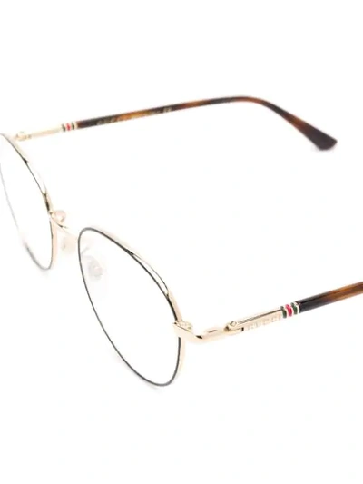 Shop Gucci Web Detail Round Frame Glasses In Black