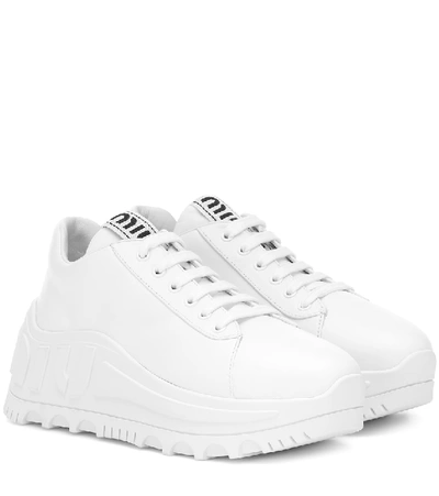 Shop Miu Miu Leather Flatform Sneakers In White