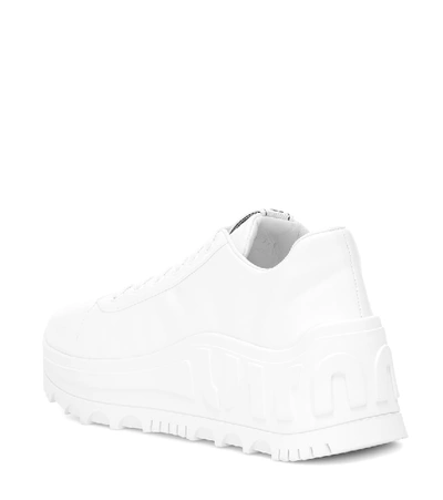 Shop Miu Miu Leather Flatform Sneakers In White