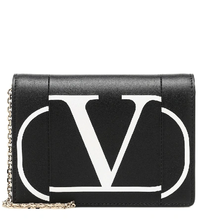 Shop Valentino Vlogo Leather Clutch In Black