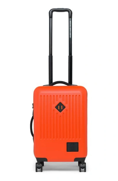 Shop Herschel Supply Co Small Trade 23-inch Rolling Suitcase - Orange In Vermillion Orange