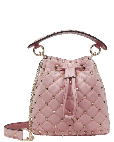 Shop Valentino Rockstud Spike Quilted Bucket Bag In Pink