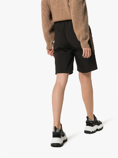 Shop Fendi Logo Stripe Shorts In Black