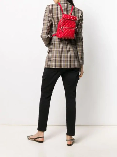 Shop Valentino Garavani Mini Rockstud Spike Backpack In Ju5 Red