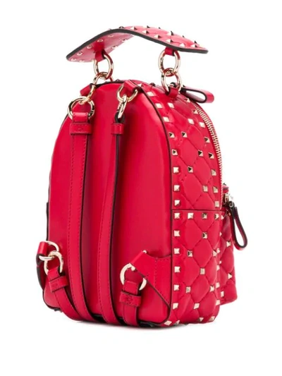 Shop Valentino Garavani Mini Rockstud Spike Backpack In Ju5 Red