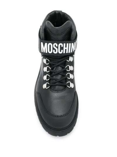 Shop Moschino Flat Hiking Boots In Black