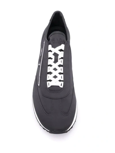 Shop Prada Logo Patch Sneakers In Black