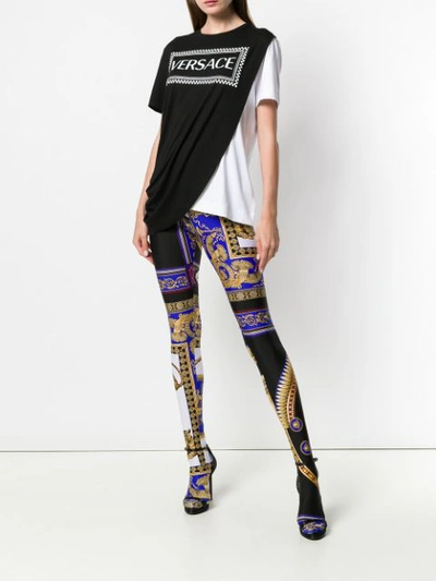 Shop Versace The Lovers Print Tights - Blue