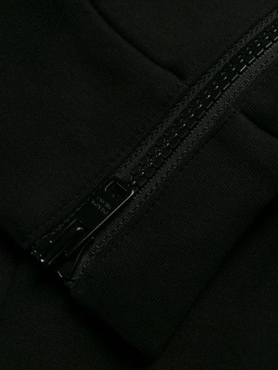 Shop Prada Cropped-jogginghose In Black