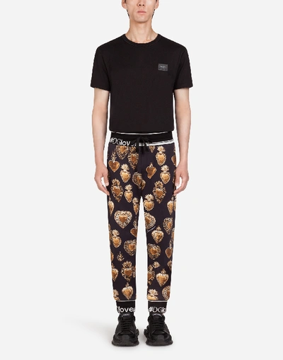 Shop Dolce & Gabbana Jersey Jogging Pants With Sacred Heart Print In Black