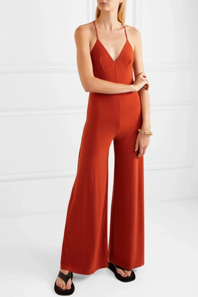 Shop Norma Kamali Stretch-jersey Jumpsuit In Red