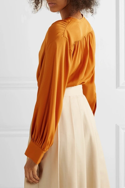 Shop Vince Stretch-silk Blouse In Orange