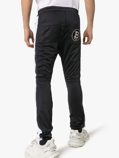 Shop Balmain Logo Embroidered Sweatpants In Black
