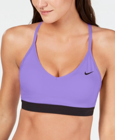 Shop Nike Indy Light-support Compression Sports Bra In Purple