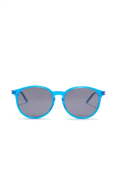 Shop Saint Laurent 52mm Round Sunglasses In Shiny Transparent Fluorescent Blue