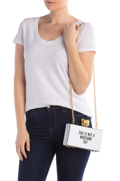 Shop Moschino Printed Push-lock Leather Clutch In Wht Blh