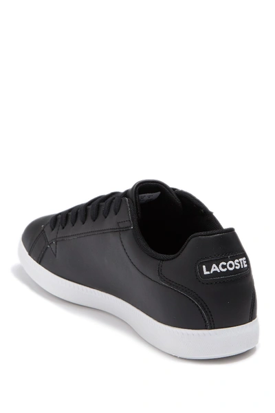 Shop Lacoste Graduate Leather Sneaker In Black/white