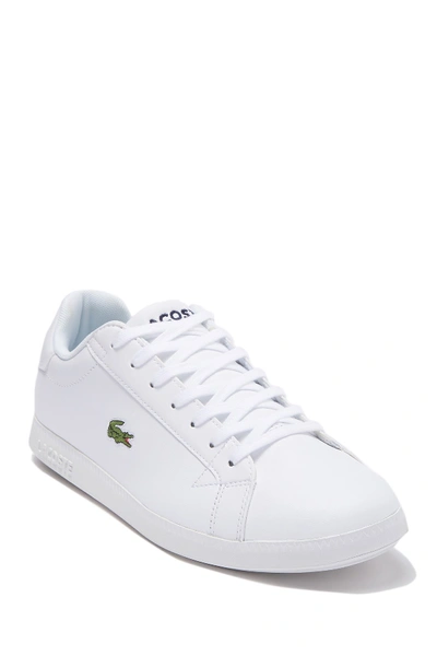 Shop Lacoste Graduate Leather Sneaker In White/white