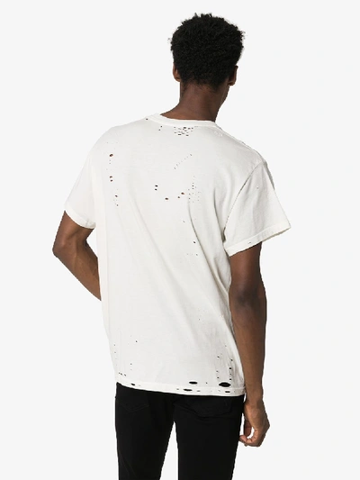 Shop Amiri Chaos Logo Print Distressed Cotton T-shirt In White
