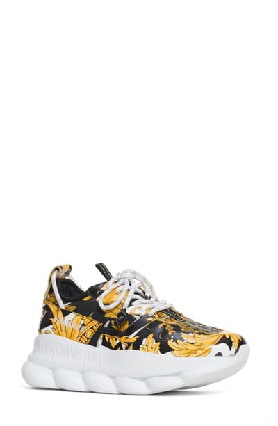 Shop Versace Chain Reaction Sneaker In White/ Black/ Gold