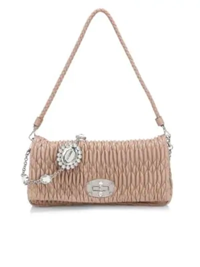 Shop Miu Miu Crystal-embellished Matelassé Leather Shoulder Bag In Cammeo