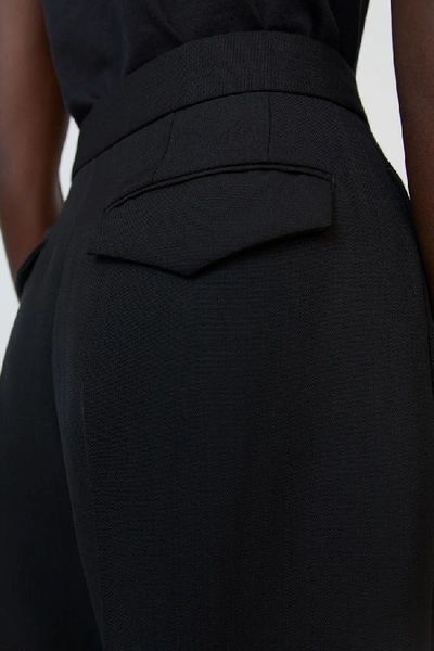 Shop Acne Studios Double Pleated Trousers Black