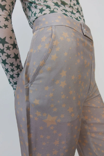 Shop Acne Studios Star-print Flared Trousers Lilac Purple