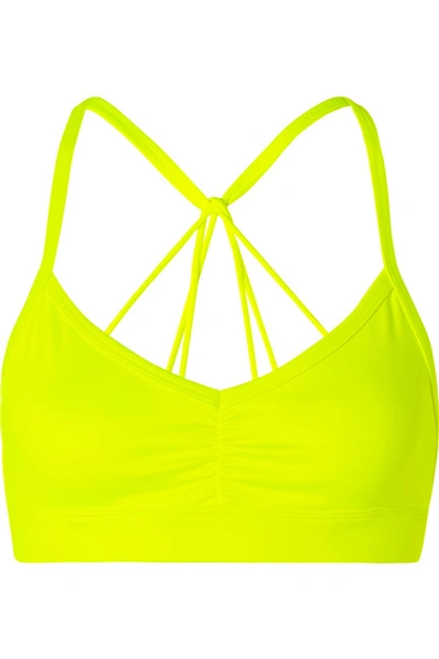 Shop Alo Yoga Sunny Neon Ruched Stretch Sports Bra In Bright Yellow
