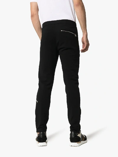 Shop Alexander Mcqueen Zip Cuff Cotton Sweatpants In Black