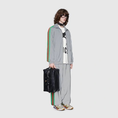 Shop Gucci Oversize Reflective Jersey Jacket In Silver