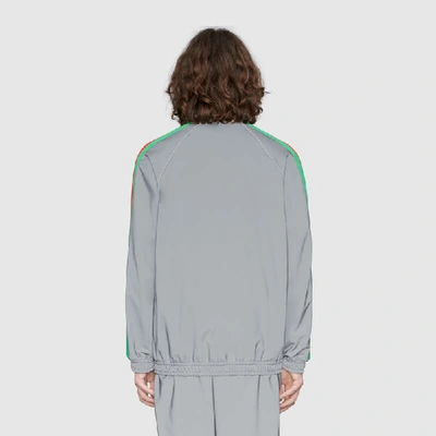 Shop Gucci Oversize Reflective Jersey Jacket In Silver