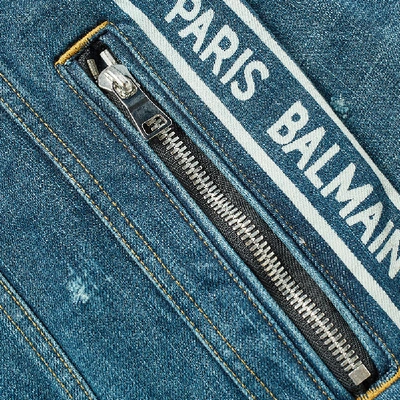 Shop Balmain Taped Logo Distressed Denim Jacket In Blue