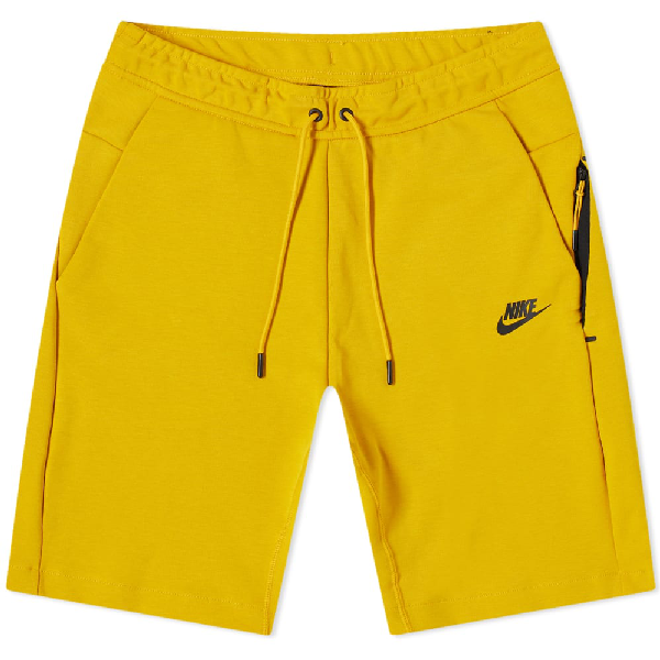 yellow nike fleece shorts