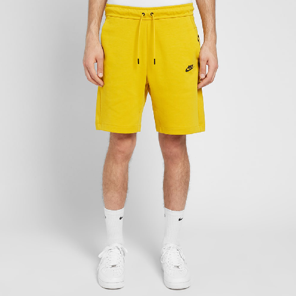 nike tech fleece shorts yellow