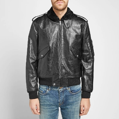 Shop Saint Laurent Leather Shearling Bomber Jacket In Black