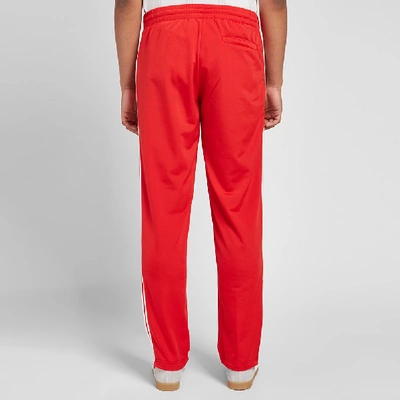 Shop Adidas Originals Adidas Firebird Track Pant In Red