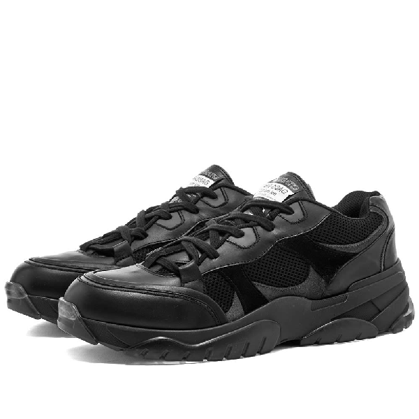 black leather low top trainers