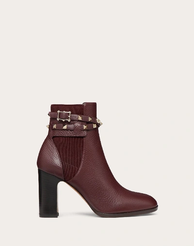 Shop Valentino Garavani Rockstud Grainy Calfskin Ankle Boot 90 Mm In Rubin