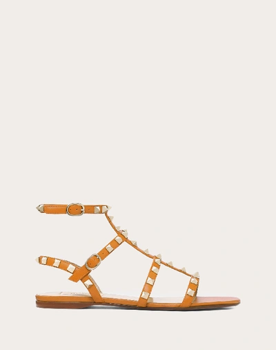 Shop Valentino Garavani Rockstud Calfskin Ankle Strap Flat Sandal In Tan